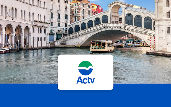 Venice ACTV water taxi near Rialto Bridge on the Grand Canal.