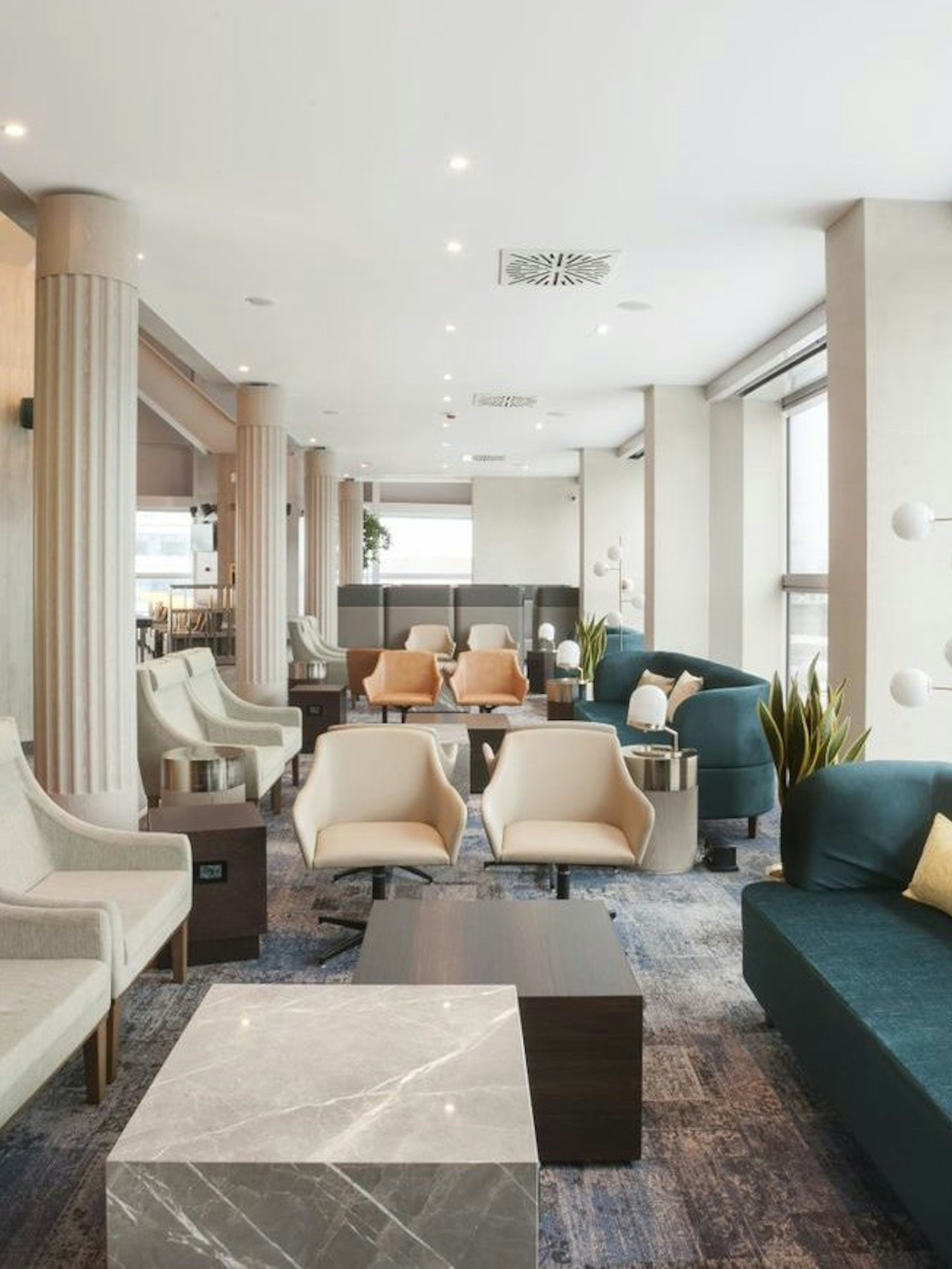 Plaza Premium Lounge seating area in Terminal 1, Leonardo da Vinci-Fiumicino Airport.