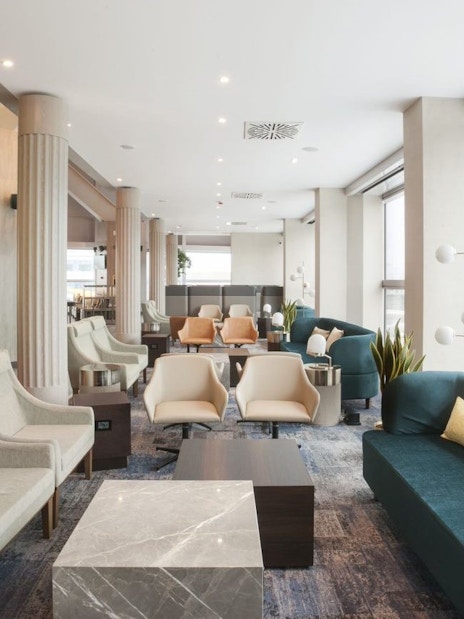 Plaza Premium Lounge seating area in Terminal 1, Leonardo da Vinci-Fiumicino Airport.