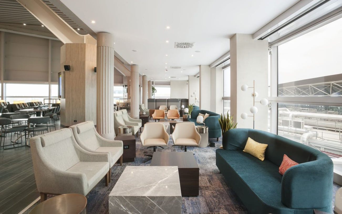 Plaza Premium Lounge seating area in Terminal 1, Leonardo da Vinci-Fiumicino Airport.