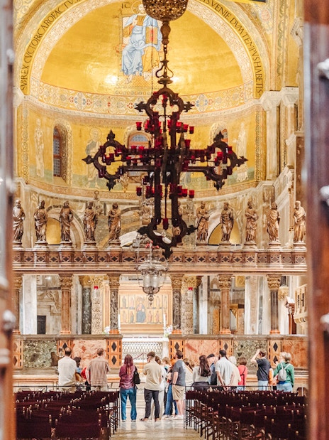 Visitors inside St. Mark's Basilica during an exclusive after-hours tour in Venice.