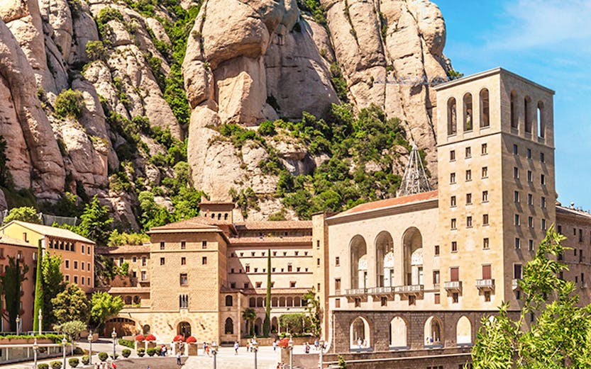 Montserrat Monastery with rocky mountain backdrop in Catalonia, Spain.