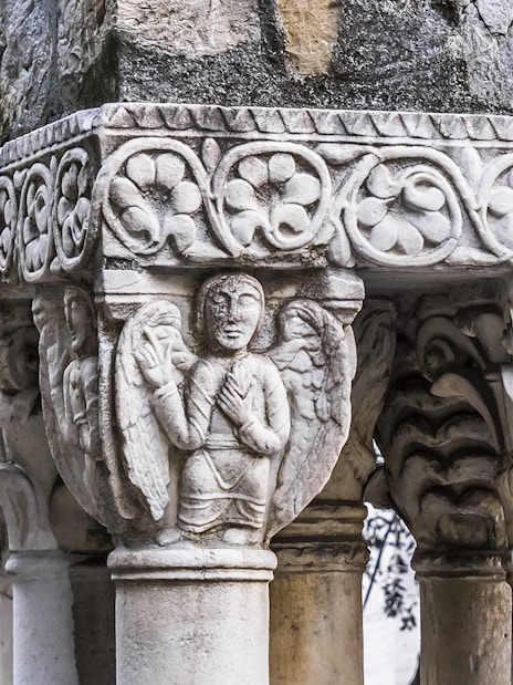 Stone column with intricate carvings at Casa di Colombo, Genoa.