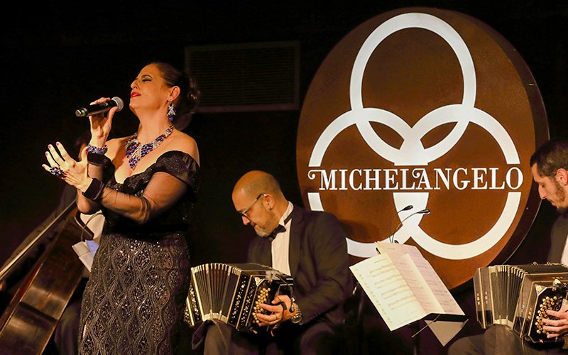 Singer and musicians performing at Michelangelo Tango Show.