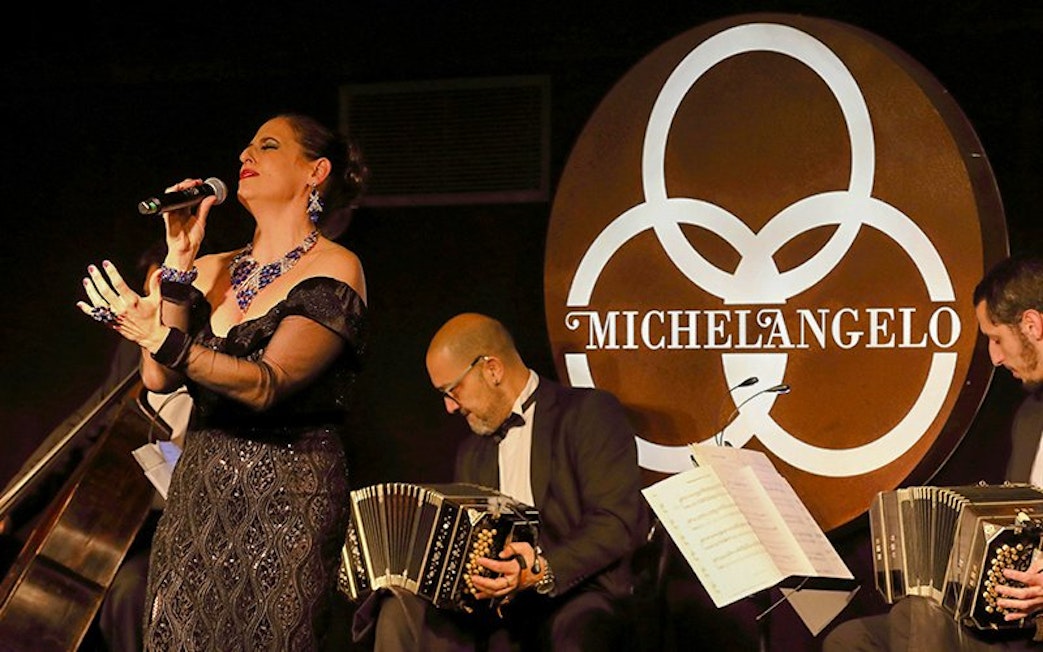 Singer and musicians performing at Michelangelo Tango Show.