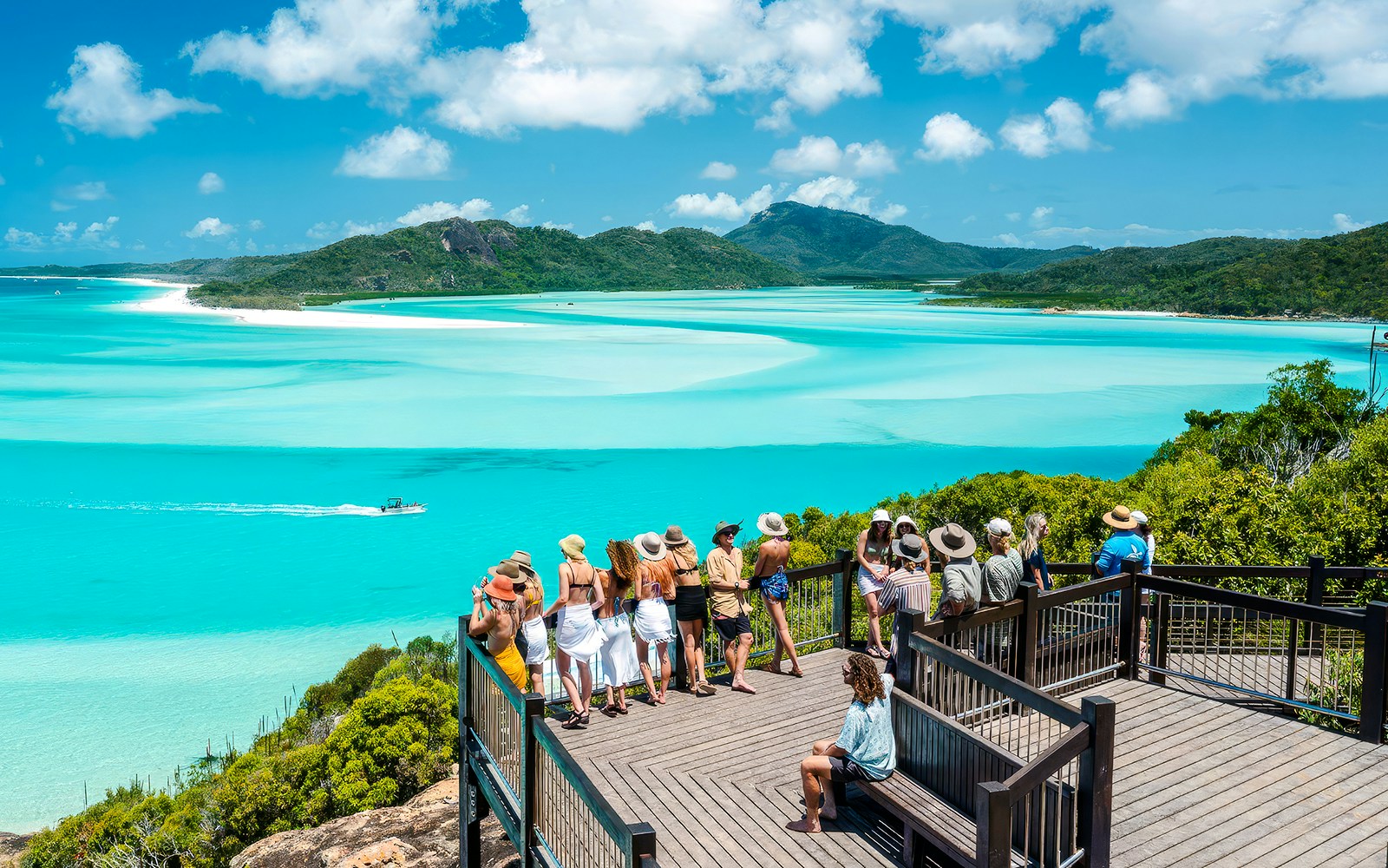 Visitors enjoying the view from Southern Whitehaven Beach Lookout, Whitsundays.