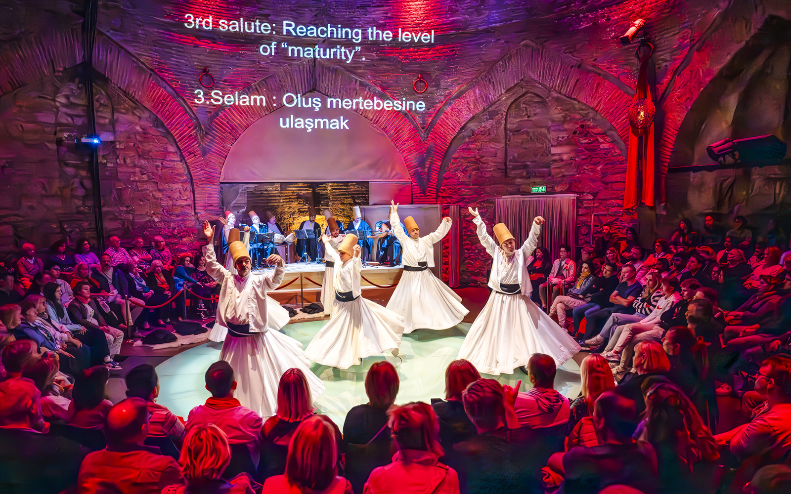 Whirling dervishes performing at Hodjapasha Cultural Center in Istanbul.