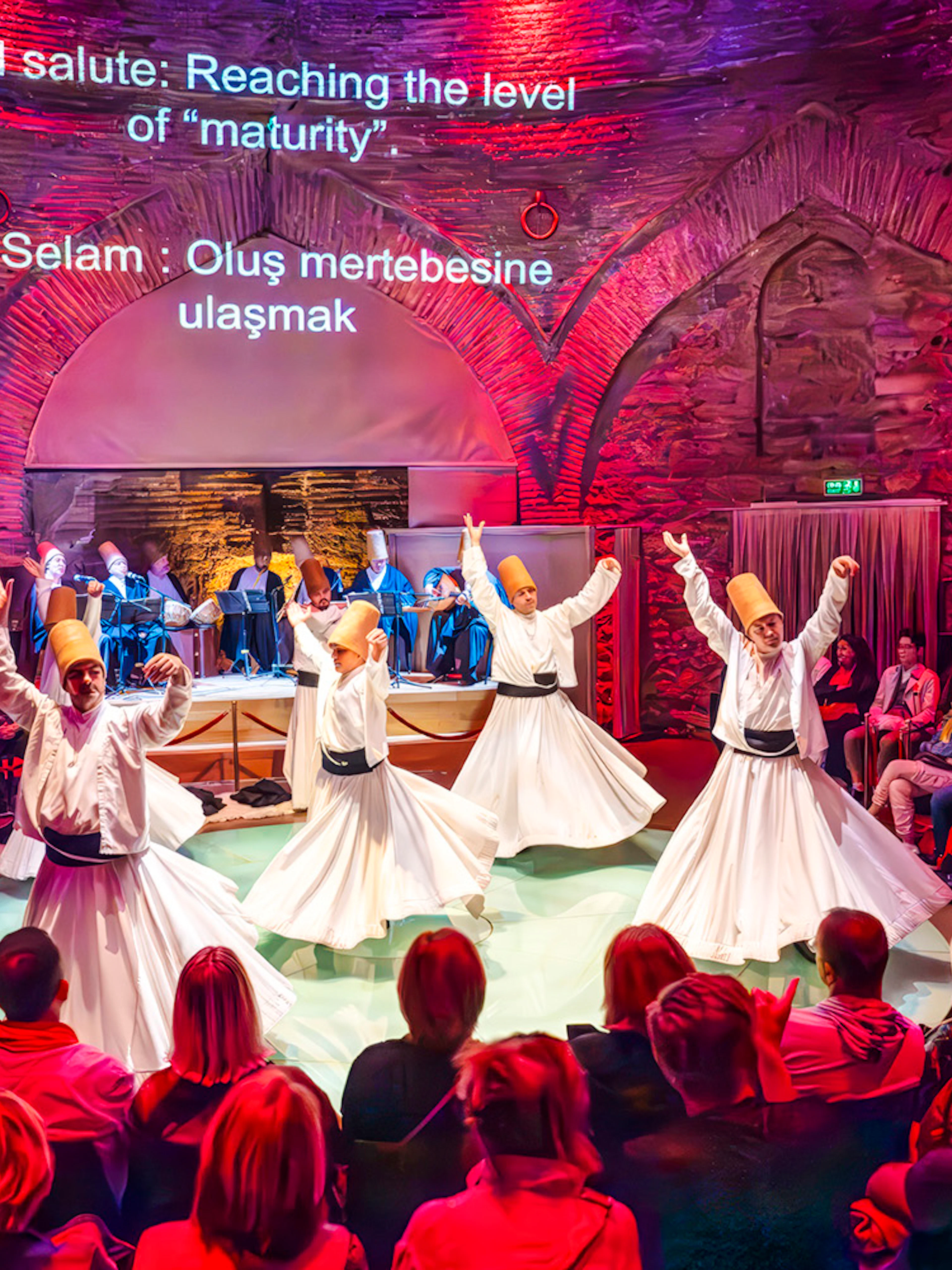 Whirling dervishes performing at Hodjapasha Cultural Center in Istanbul.