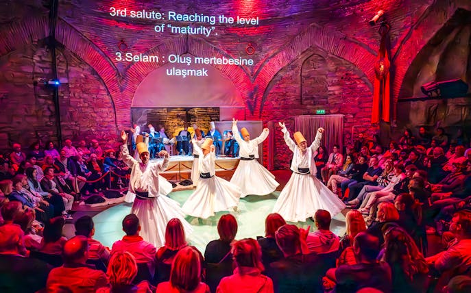 Whirling dervishes performing at Hodjapasha Cultural Center in Istanbul.