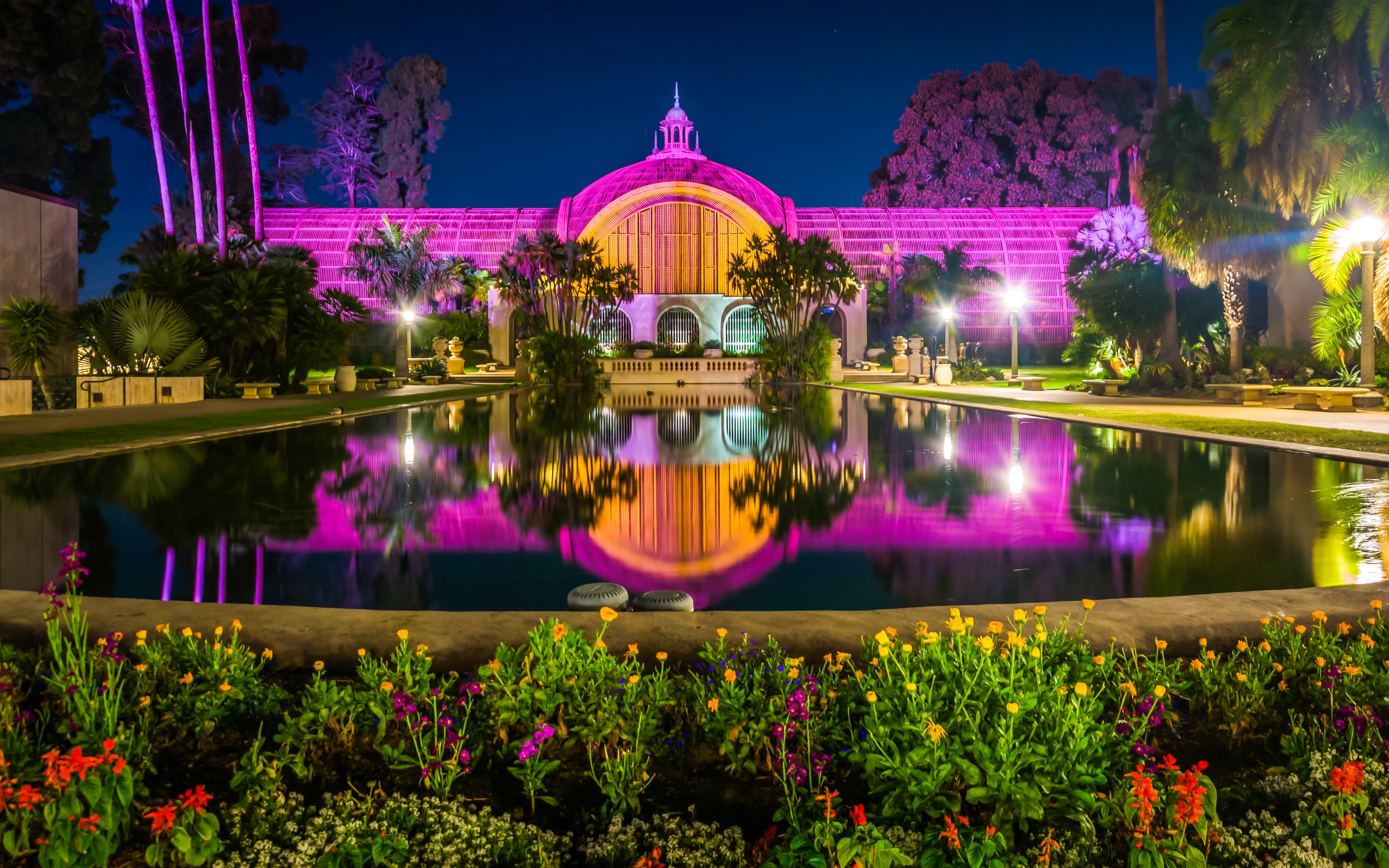 Botanical Building and Lily Pond illuminated at night, Balboa Park, San Diego.