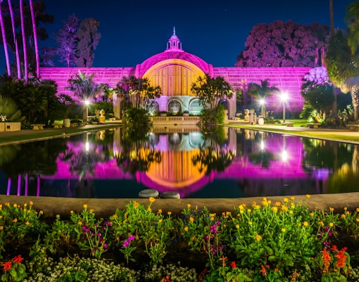 Botanical Building and Lily Pond illuminated at night, Balboa Park, San Diego.