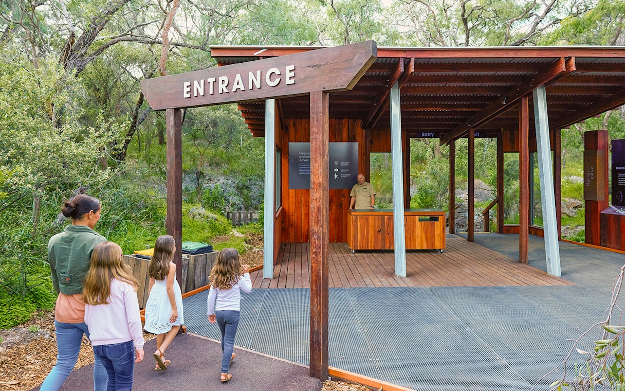 Visitors entering Ngilgi Cave Ancient Lands Experience in Australia.
