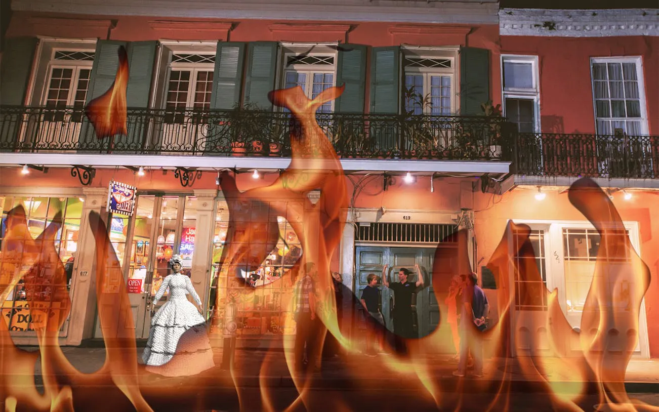 Ghostly figure and flames in front of a historic New Orleans building during an interactive walking tour.