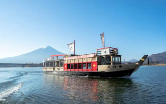 Kawaguchiko sight-boat “Appare” on Lake Kawaguchi with Mt. Fuji in the background.
