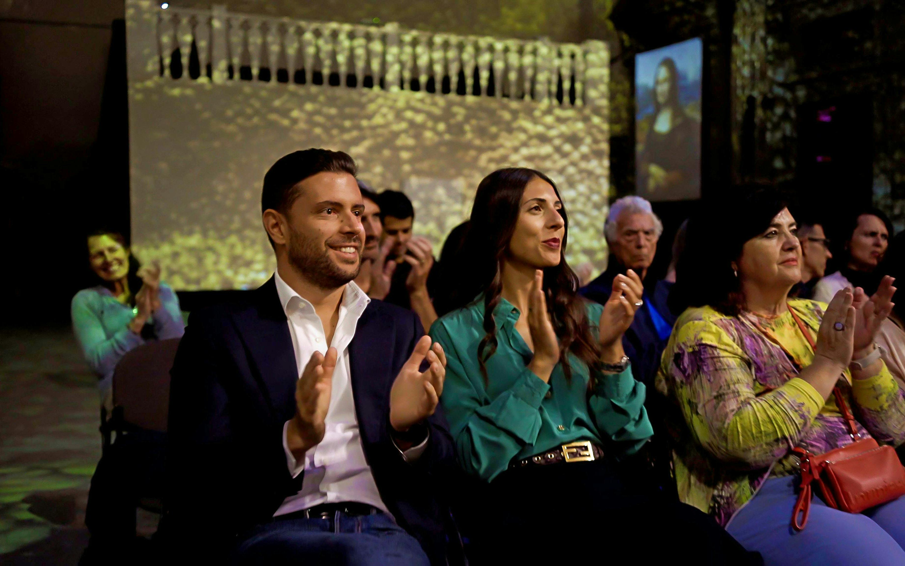 Audience applauding during a Tuscan dinner and Three Tenors concert in Florence.