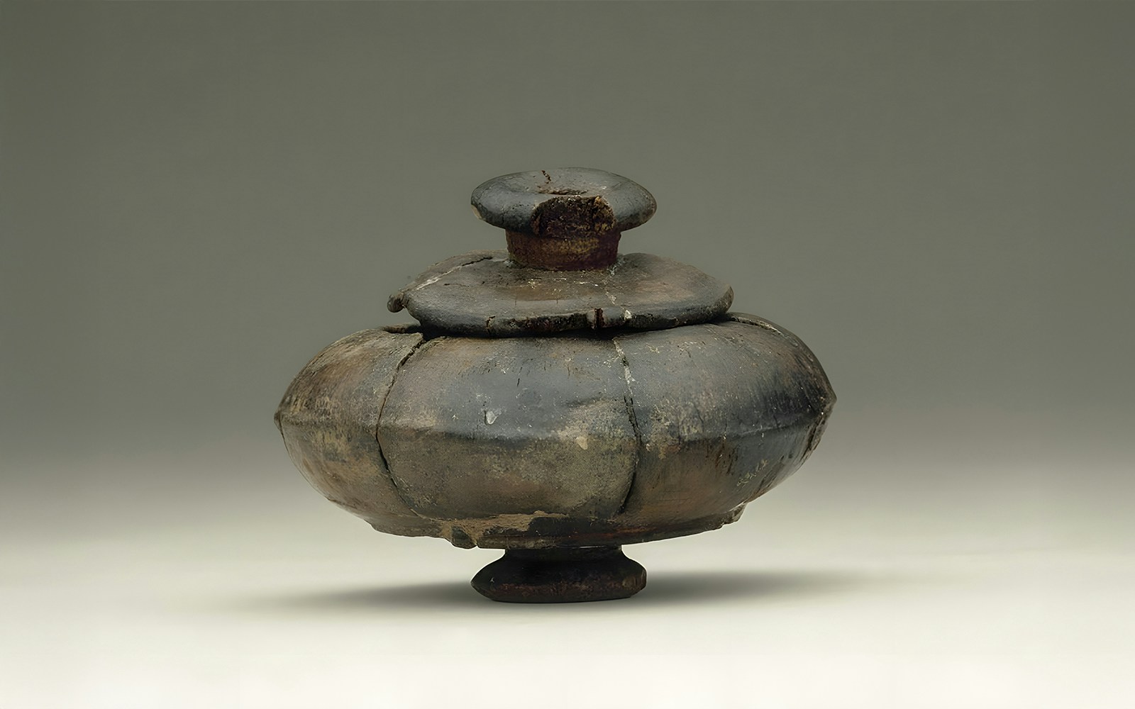 Wooden bowl artifact displayed at the National Museum of Denmark.