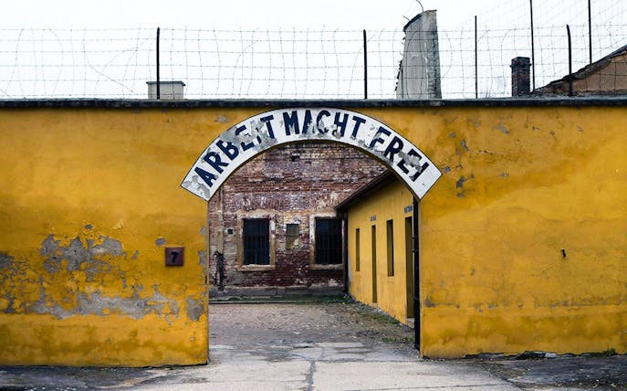 Entrance gate of Terezin concentration camp with "Arbeit Macht Frei" sign.