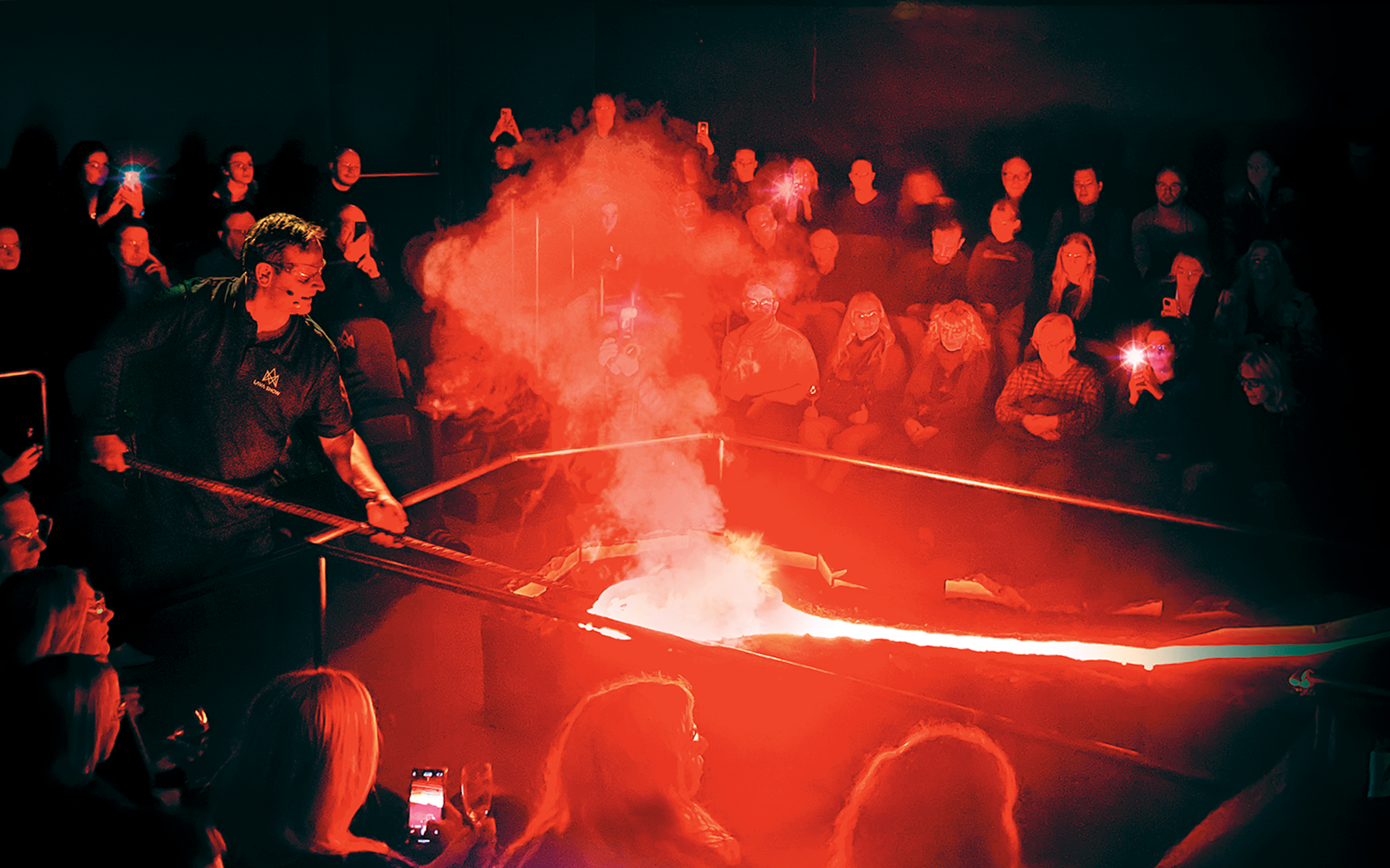 Guests watching a live lava demonstration in Reykjavik.