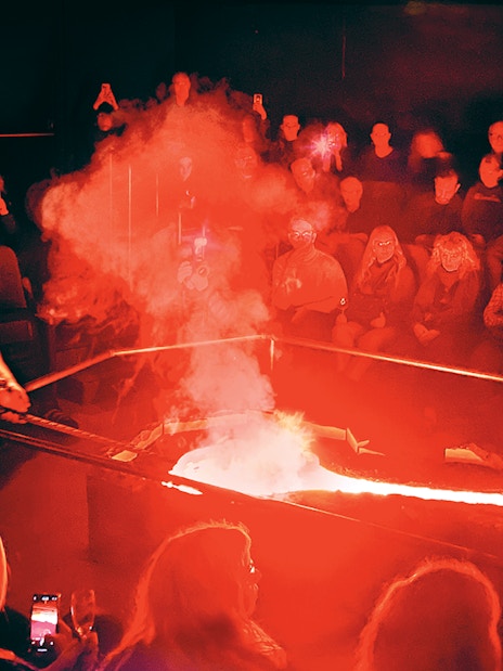 Guests watching a live lava demonstration in Reykjavik.