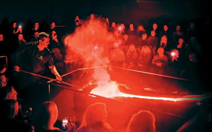 Guests watching a live lava demonstration in Reykjavik.