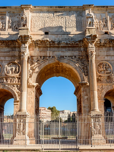 Arch of Constantine near the Colosseum in Rome, part of the guided tour with arena access.