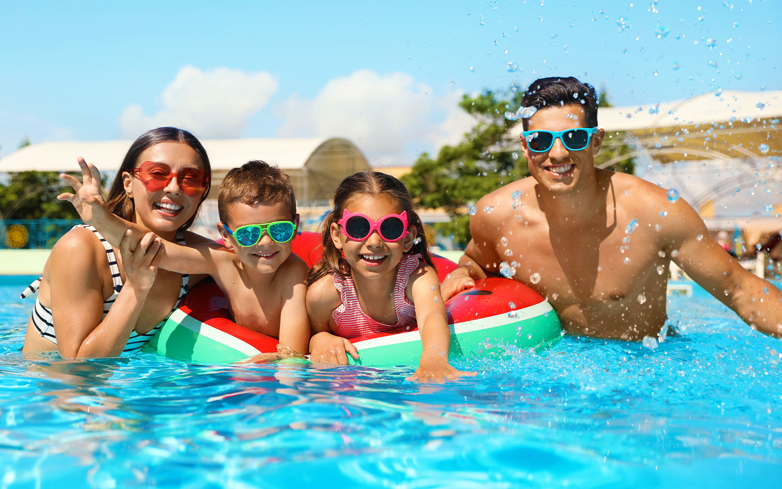 Family enjoying a pool day at Slide N' Splash water park.