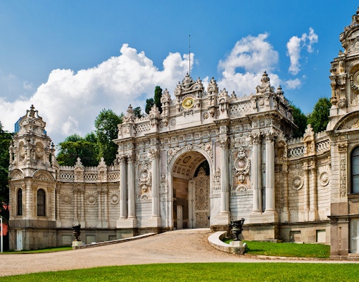 Dolmabahce Palace exterior view during guided tour in Istanbul, Turkey.