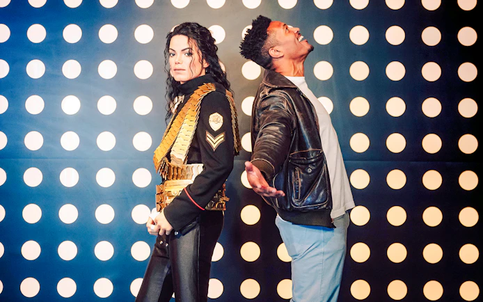 Guests interacting with wax figures at Madame Tussauds Nashville.