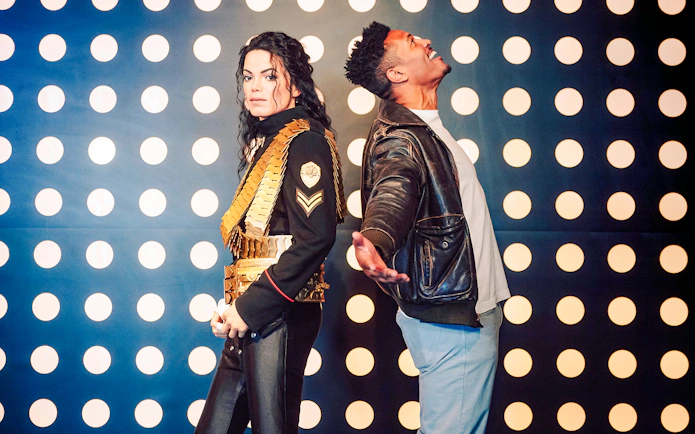 Guests interacting with wax figures at Madame Tussauds Nashville.