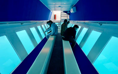 Passengers viewing underwater scenery on Yellow Submarine Cruise, Rhodes.