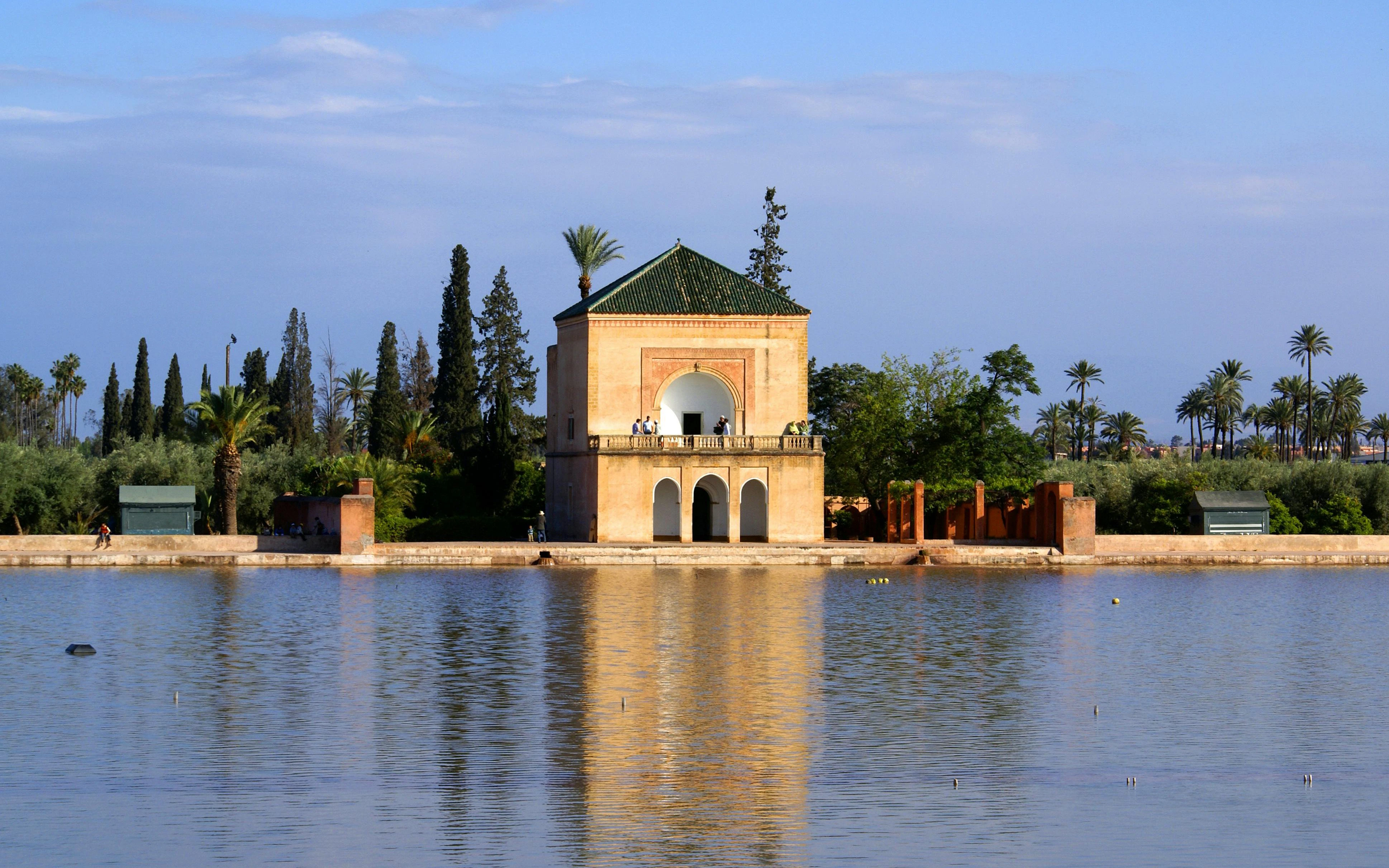 The mirrored basin and green roof