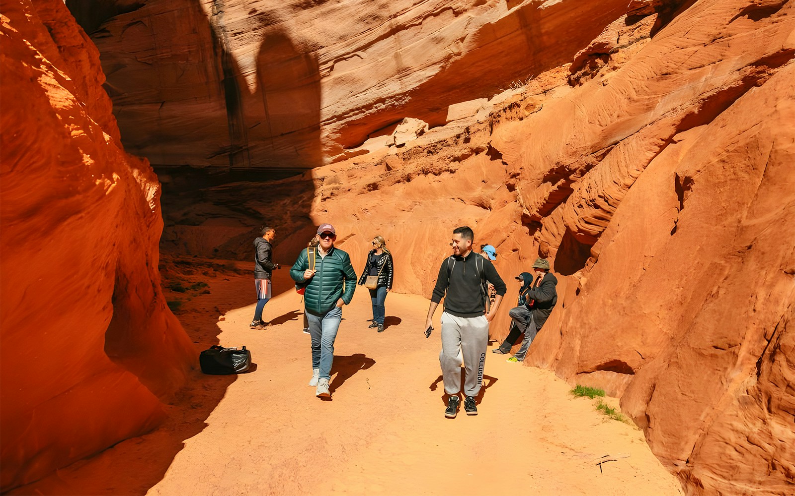 Guests exploring the red rock formations of Antelope Canyon.