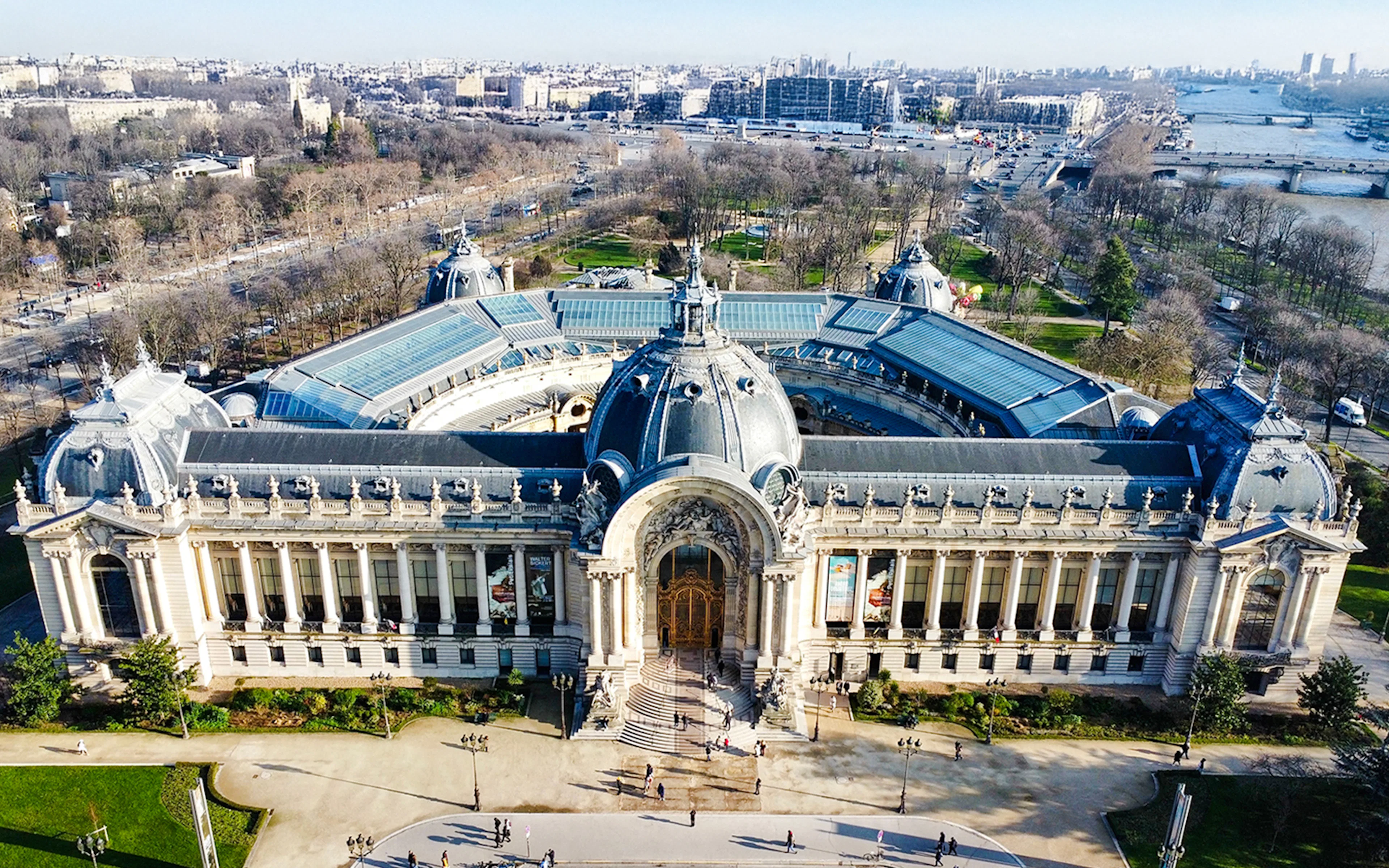 Aerial view of Petit Palais in Paris, showcasing its grand architecture and surrounding gardens.