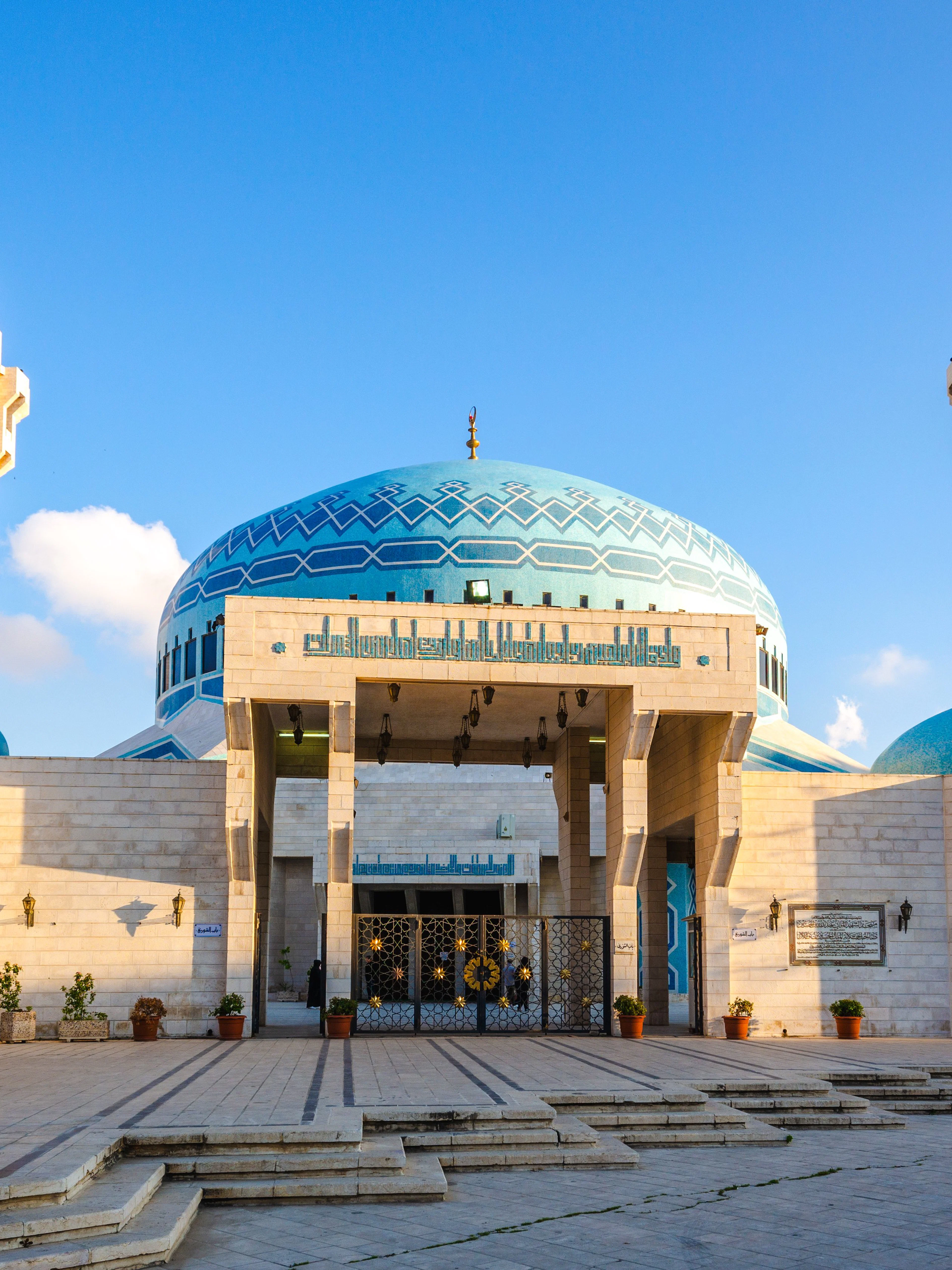 King Abdullah I Mosque with blue domes and minarets in Amman, Jordan.