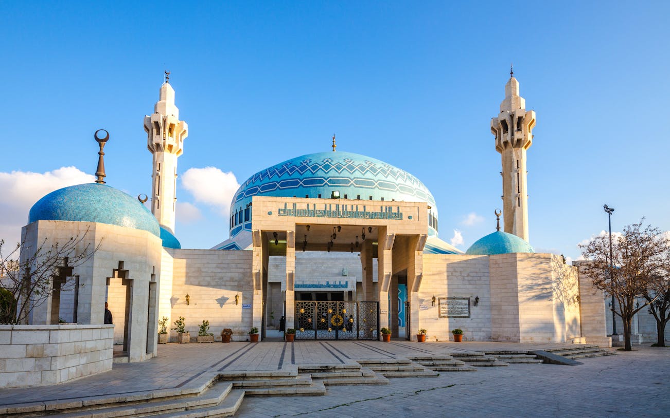 King Abdullah I Mosque with blue domes and minarets in Amman, Jordan.