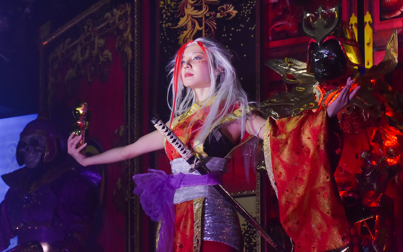 Performer in samurai-themed costume at Samurai Restaurant show.