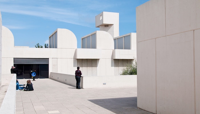 Fundació Joan Miró building exterior on Montjuïc, Barcelona, with visitors exploring.