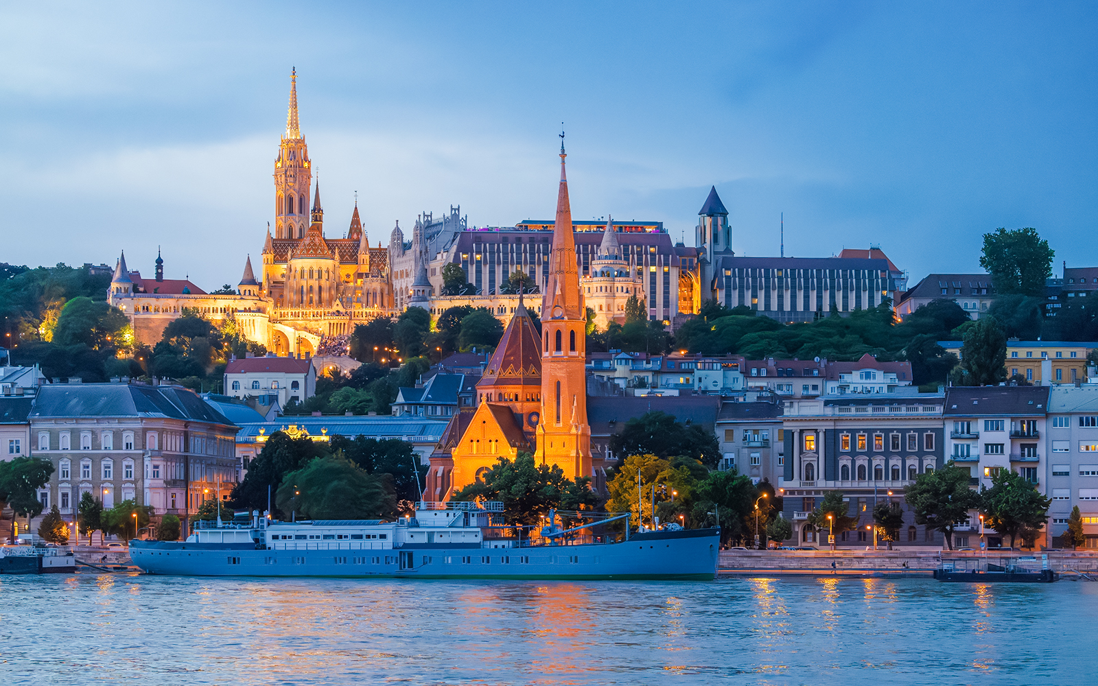 Buda Castle, Matthias Church, and Fisherman's Bastion viewed from Danube River in Budapest.