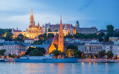Buda Castle, Matthias Church, and Fisherman's Bastion viewed from Danube River in Budapest.