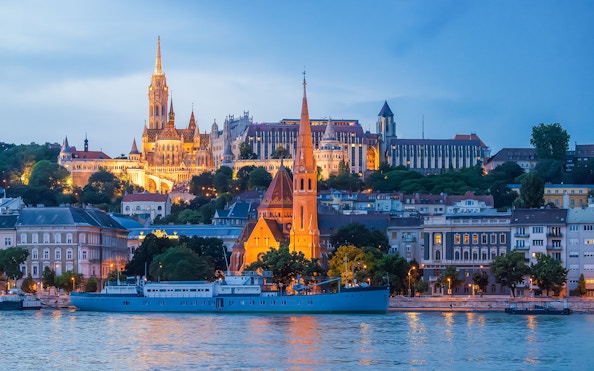 Buda Castle, Matthias Church, and Fisherman's Bastion viewed from Danube River in Budapest.