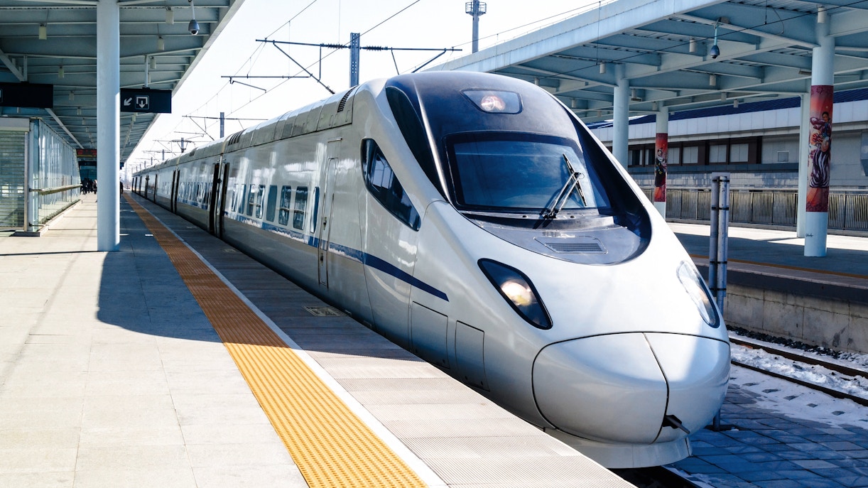 CRH high-speed bullet train at a station platform in China.