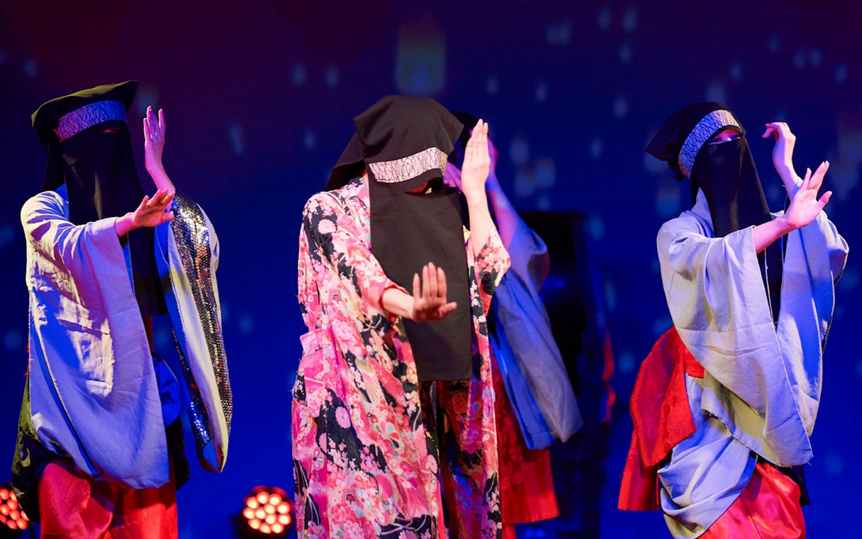 Dancers in traditional attire performing at Japan Festival Dance Show, Tokyo Tower.
