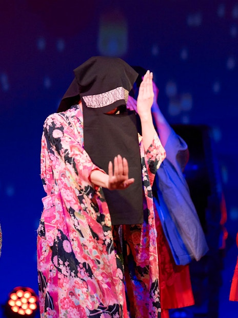 Dancers in traditional attire performing at Japan Festival Dance Show, Tokyo Tower.