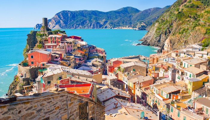 Cinque Terre coastline view with colorful cliffside villages on a semi-private guided tour.