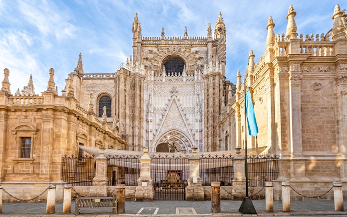 Seville Cathedral facade with Gothic architecture details in Seville, Spain.