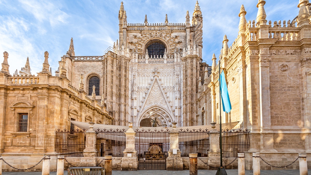 Seville Cathedral facade with Gothic architecture details in Seville, Spain.
