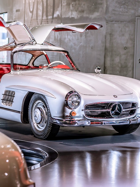 Classic Mercedes-Benz 300SL with gullwing doors inside Mercedes-Benz Museum.