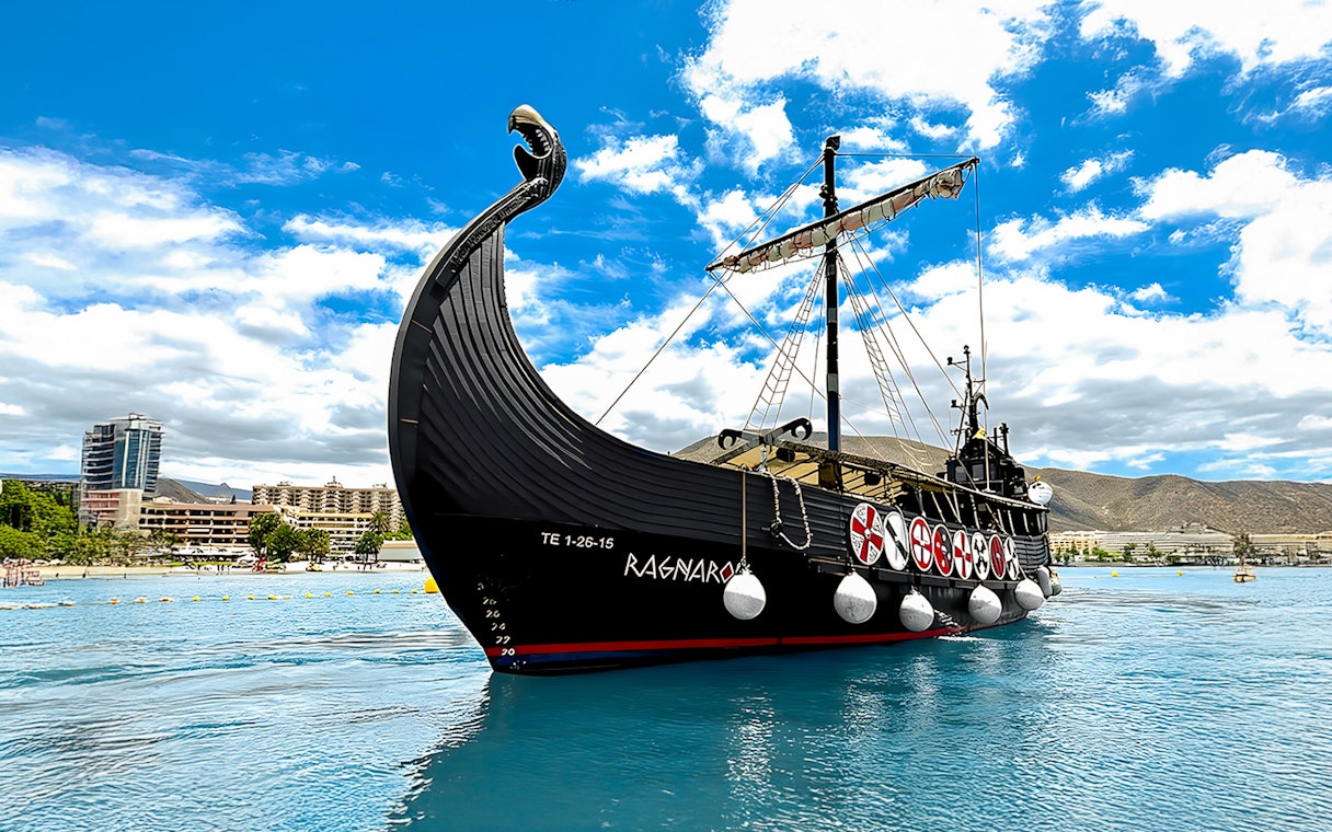 Viking ship on water for whale and dolphin watching cruise.