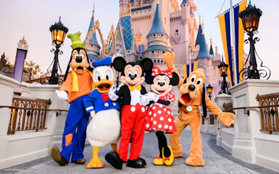 Mickey and friends in front of Cinderella Castle at Magic Kingdom, Walt Disney Resort, Orlando.