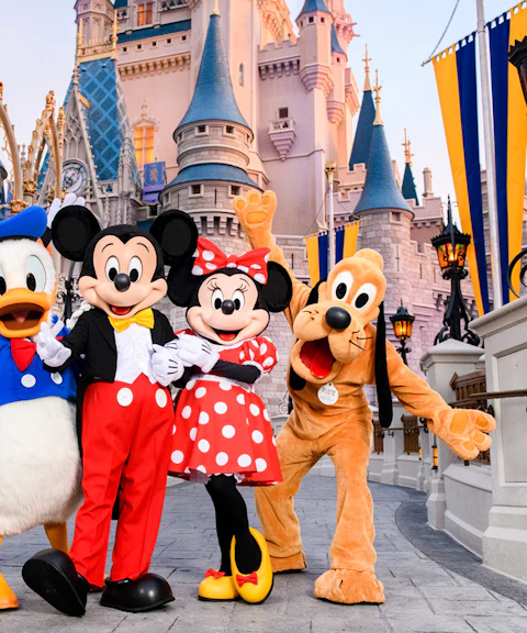 Mickey and friends in front of Cinderella Castle at Magic Kingdom, Walt Disney Resort, Orlando.